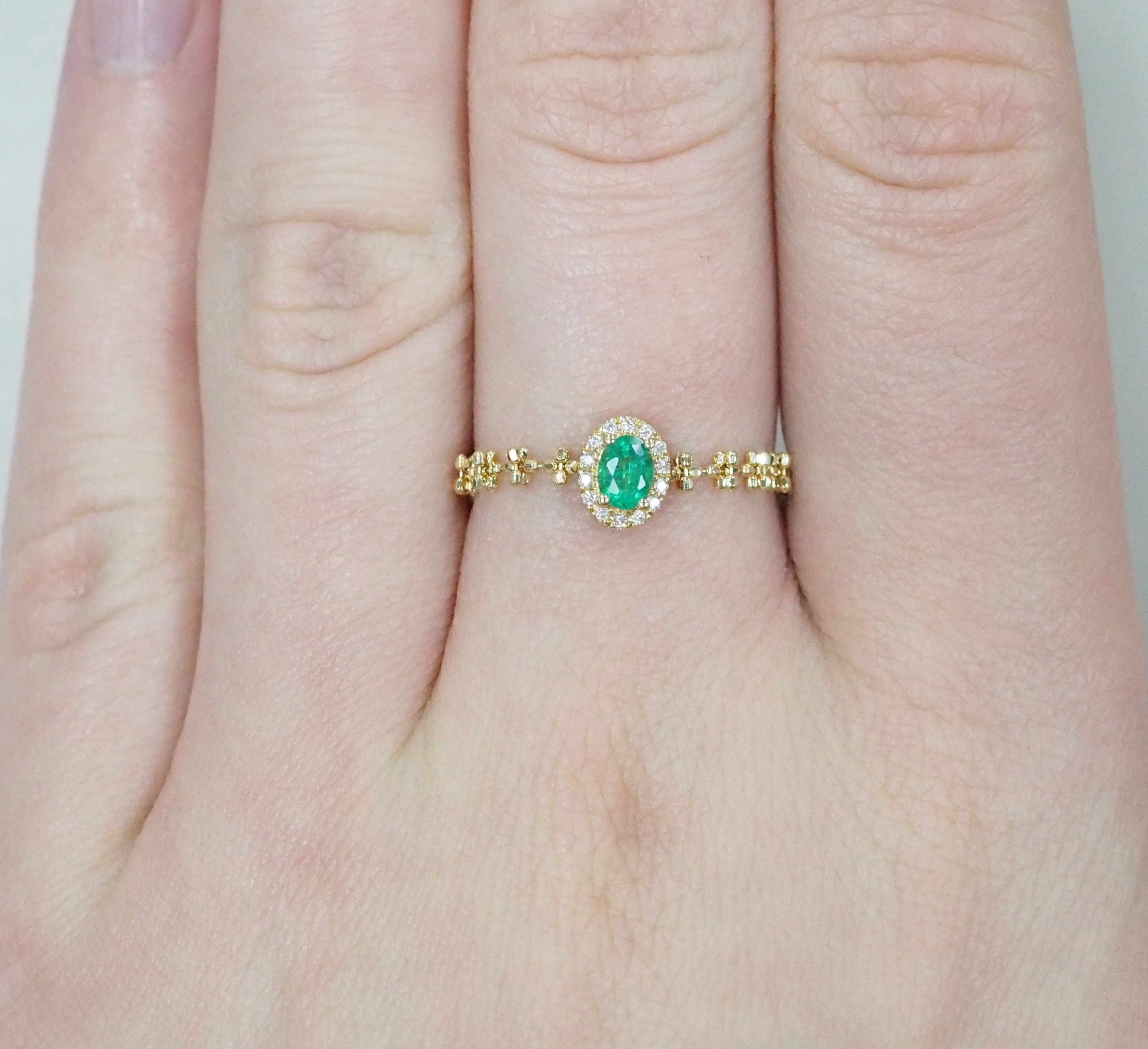 Кольцо из желтого золота с изумрудом